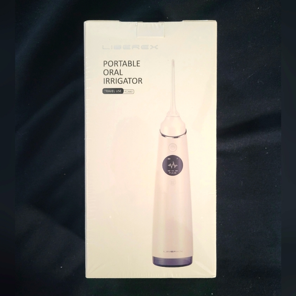 Portable Oral Irrigator/Flosser - Still in OG packaging